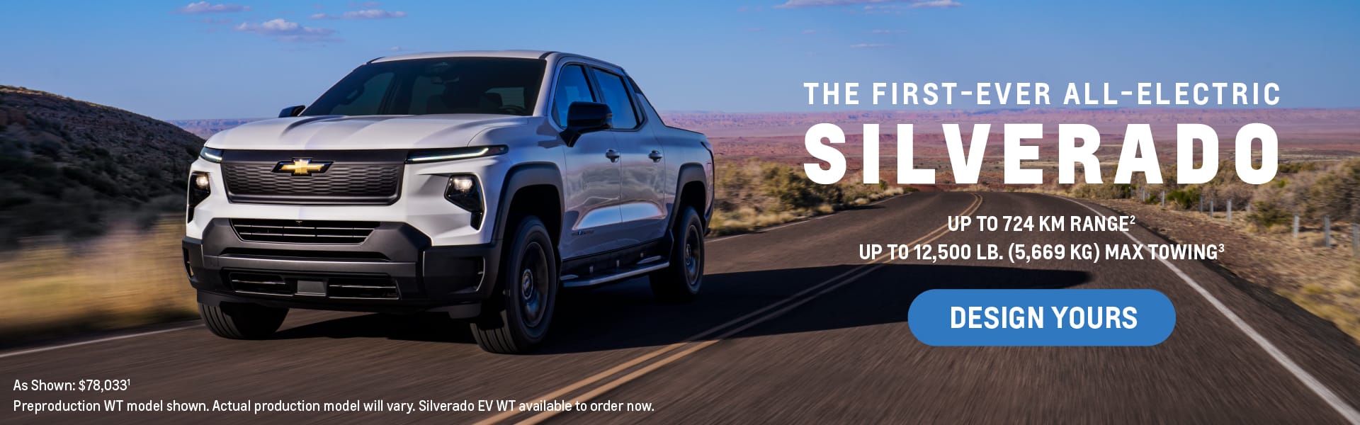 A white Chevrolet Silverado truck drives on a desert road. Text reads: The first-ever all-electric Silverado. Up to 724 km range. Up to 12,500 lb (5,669 kg) max towing. A button says, Design Yours. The background features a vast desert landscape.