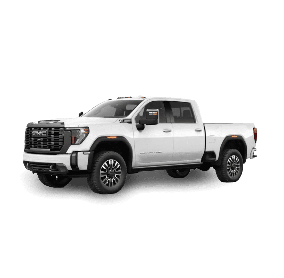 A white pickup truck with four doors and a prominent front grille is parked on a solid green background. The vehicle has large wheels and is viewed from the front-left angle.
