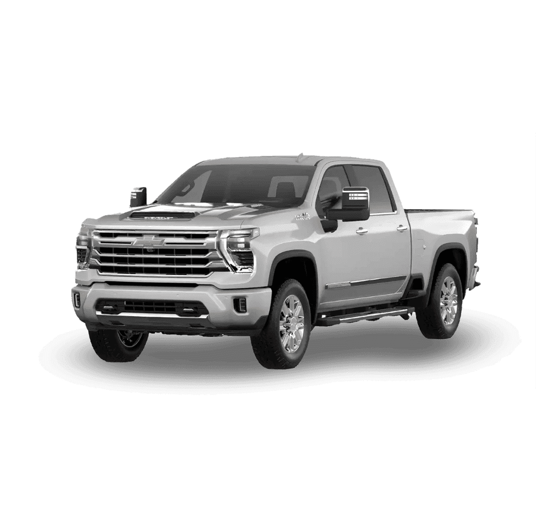 Silver pickup truck viewed from the front-right angle on a white background. The truck features a large grille, chrome accents, and extended side mirrors. It has a robust and modern design with visible details like headlights and wheels.
