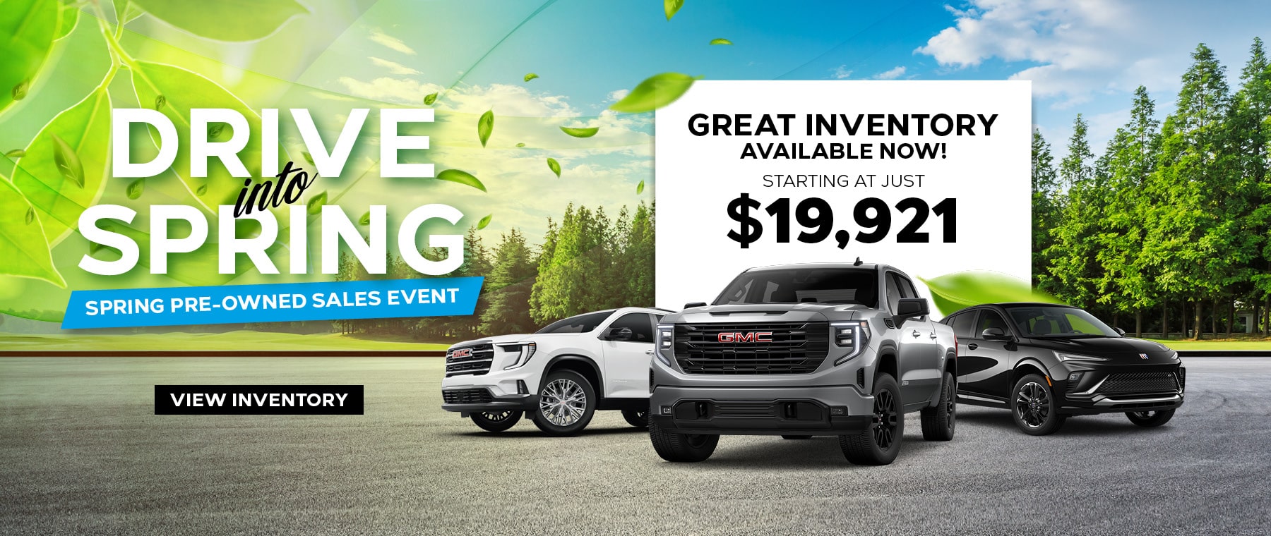 Advertisement for a car sales event titled Drive into Spring featuring three vehicles on a road, with trees and leaves in the background. A sign highlights Great Inventory Available Now! Starting at just $19,921. Button reads View Inventory.