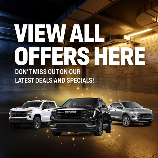 "View all offers here" text over images of three cars in a dimly lit showroom, promoting latest deals.
