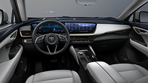 Modern car interior featuring a digital dashboard, sleek steering wheel, and plush leather seats.